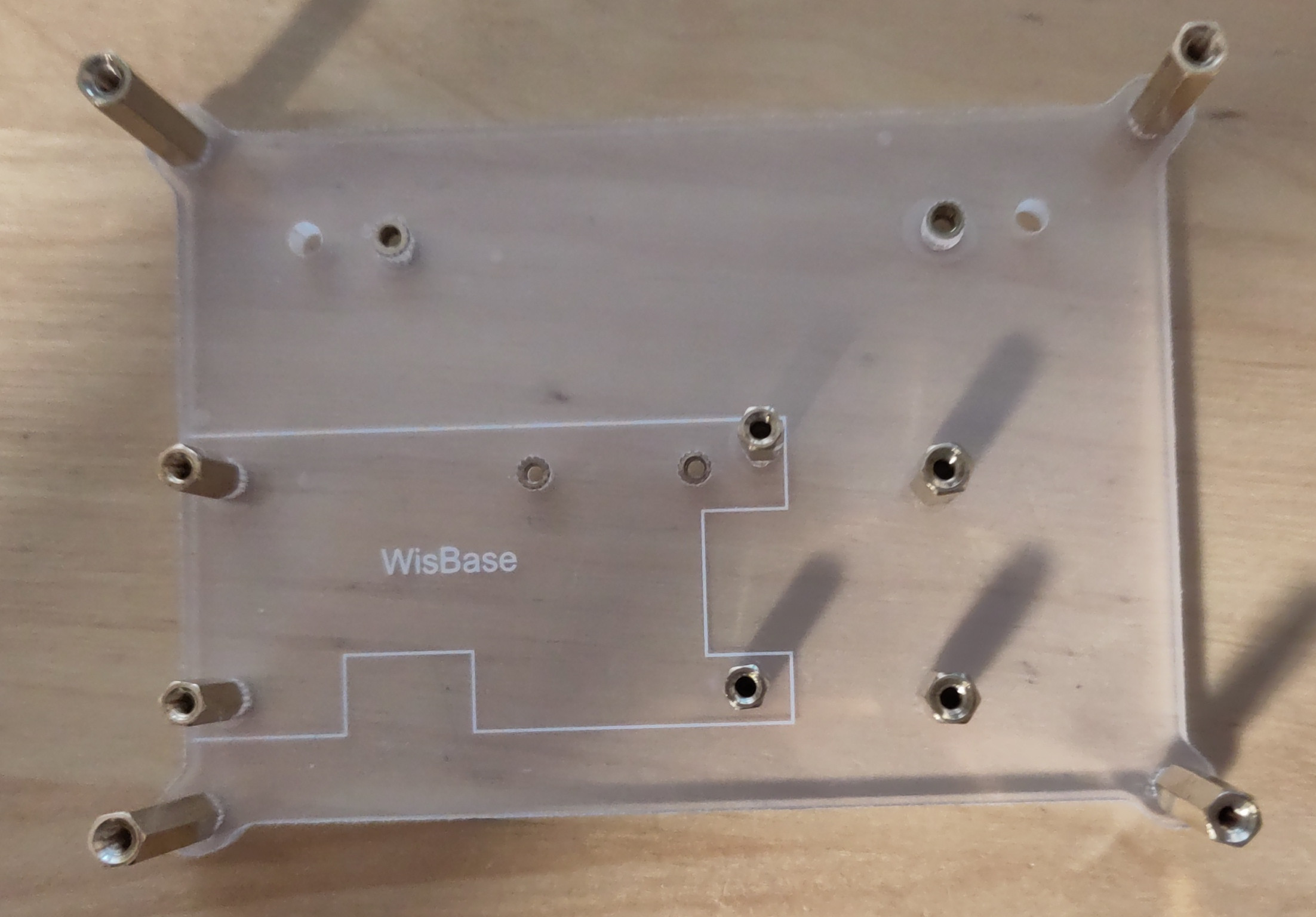You can see one of the plastic parts. Among other things, there is an area marked with "WisBase".